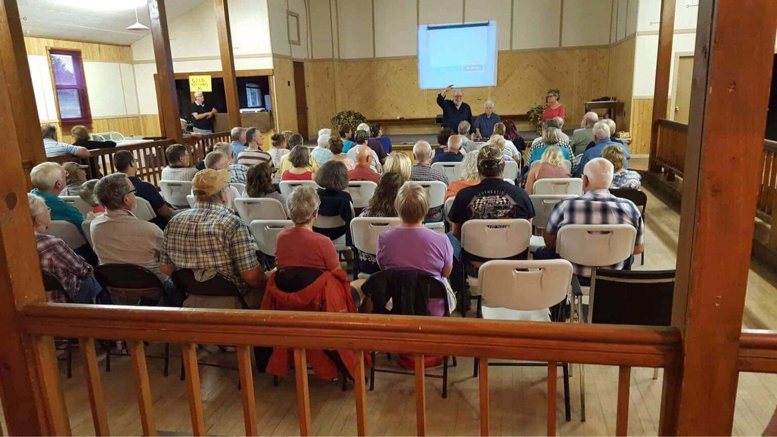 Community meeting with over 50 residents