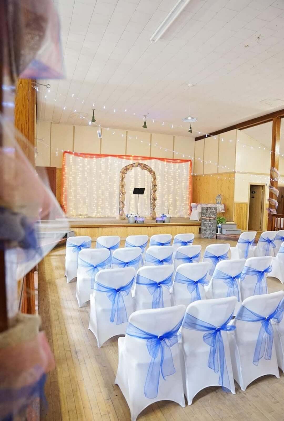 Hall beautifully decorated for a wedding ceremony